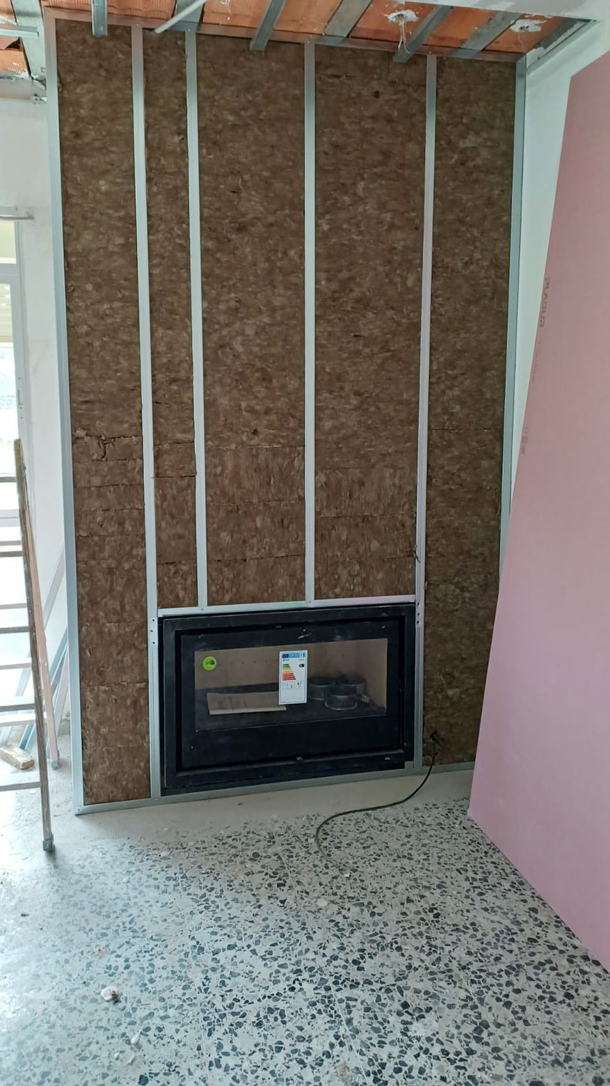 Proceso de la reforma de la chimenea de una casa completa de Reformas y Pinturas Alannita